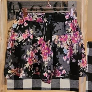 Flowy black floral shorts with drawstring waist